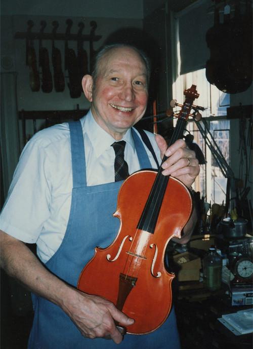 Carl Becker with one of his instruments